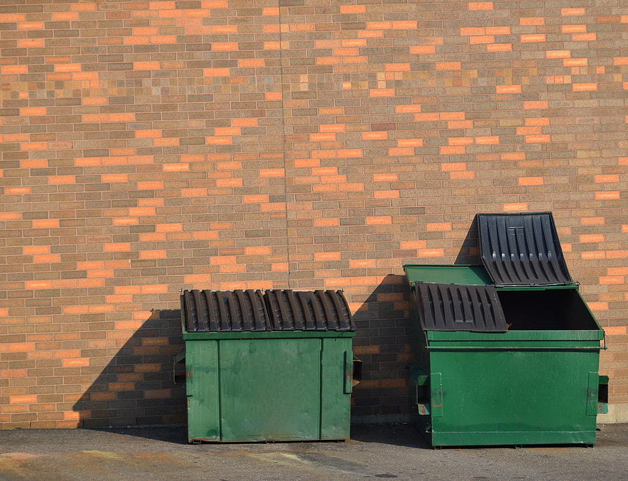 green metal garbage containers 