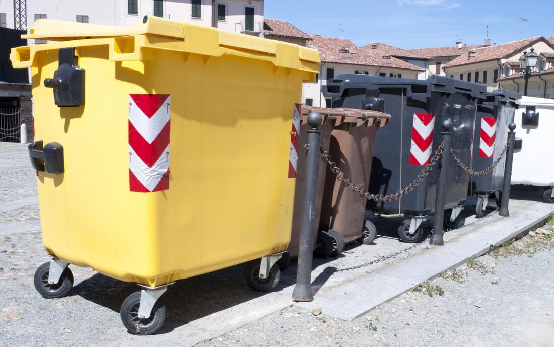 different sizes and colors of trash containers 
